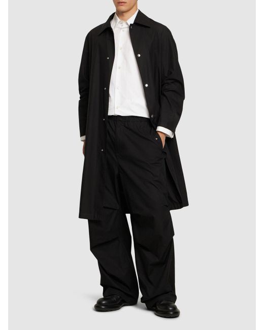 Pantaloni loose fit trousers in cotone washed di Jil Sander in Black da Uomo