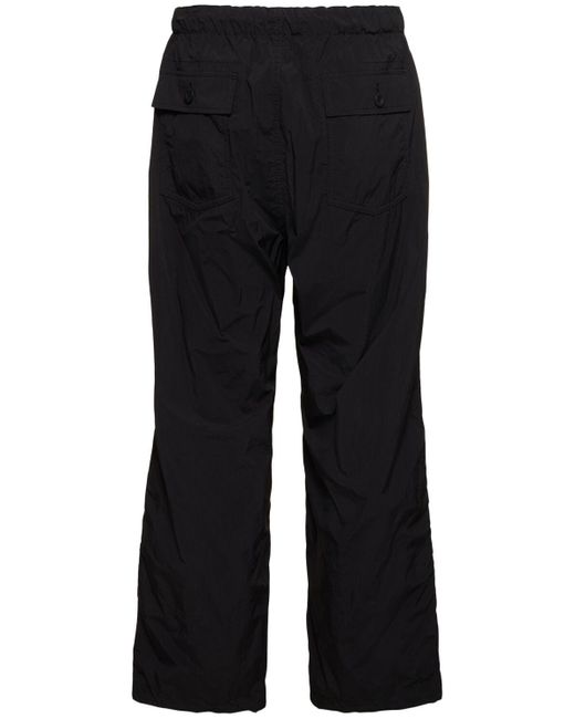 Pantalones de nylon Comme des Garçons de hombre de color Black