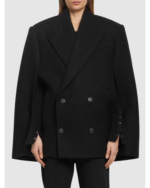 Double breasted cropped wool cape di Wardrobe NYC in Black