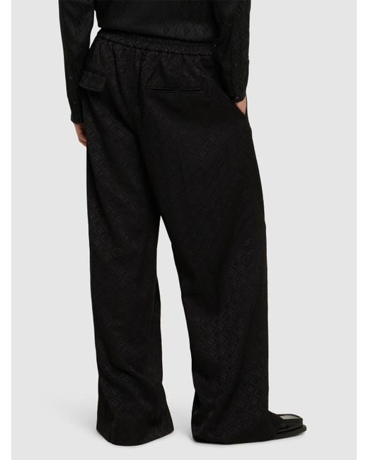 Pantalones anchos con jacquard MARINE SERRE de hombre de color Black