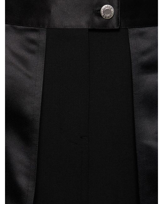 Jupe courte en tissu technique inside-out Helmut Lang en coloris Black