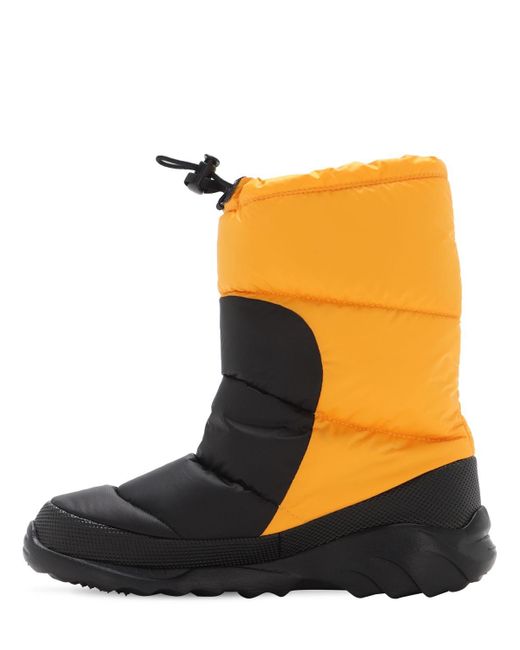 yellow north face boots