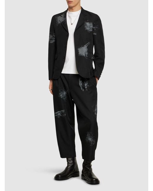 Pantaloni in twill stampato con plissé di Comme des Garçons in Black da Uomo