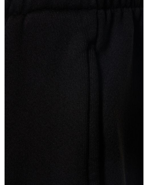 Pantaloni svasati in cotone di Les Tien in Black