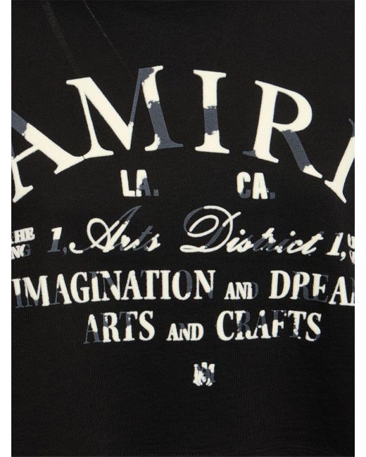 T-shirt cropped in jersey di cotone con logo di Amiri in Black