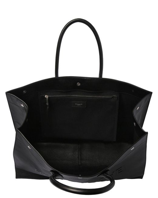 An Yves Saint Laurent Rive Gauche Bag in Black Patent Vinyl Circa 1990