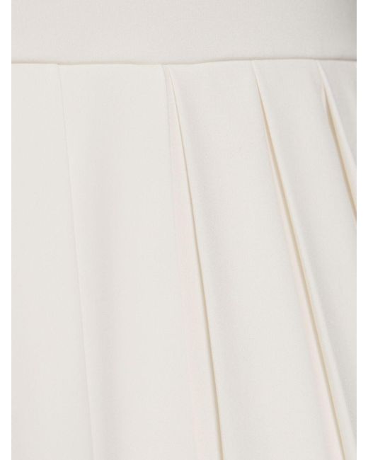Robe de tennis en tissu technique performance Tory Sport en coloris White