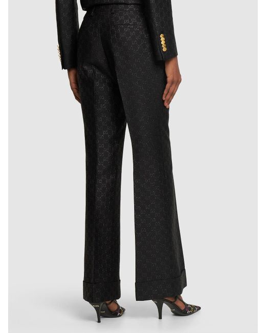 Pantalon en laine mélangée gg Gucci en coloris Black