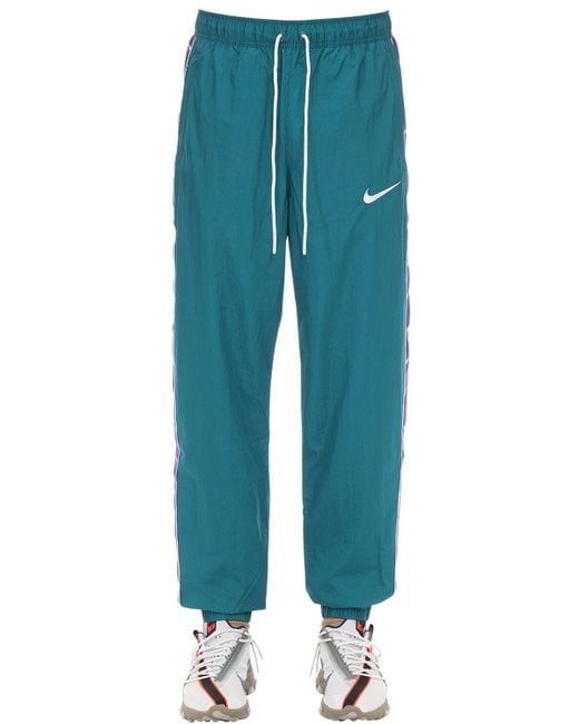 Nsw vw swoosh woven pant 2025