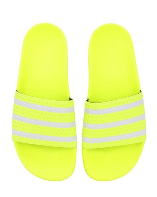 solar yellow adidas slides