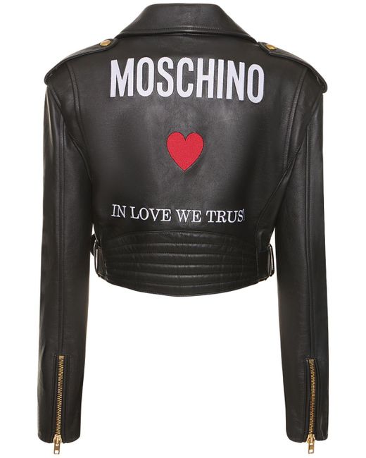 Giacca cropped in pelle con cintura e logo di Moschino in Black