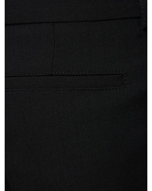 Pantalon évasé en crêpe de laine mélangée Acne en coloris Black