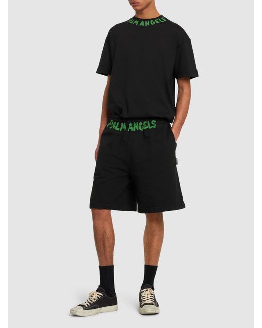 Pantaloni in felpa di cotone con logo di Palm Angels in Green da Uomo