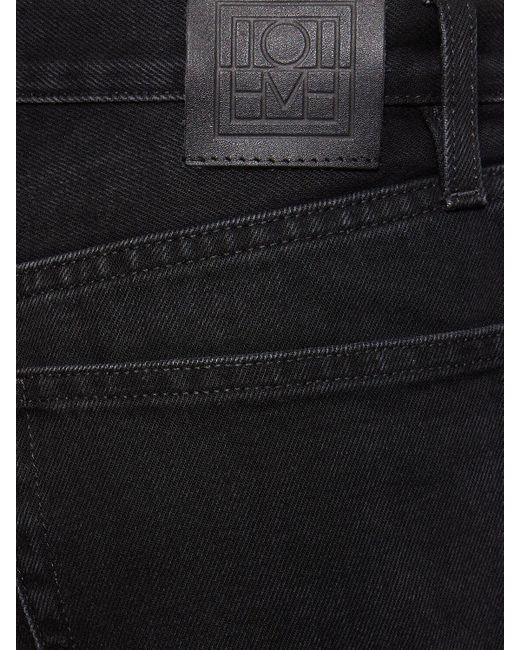 Jeans rectos de denim de algodón Totême  de color Black