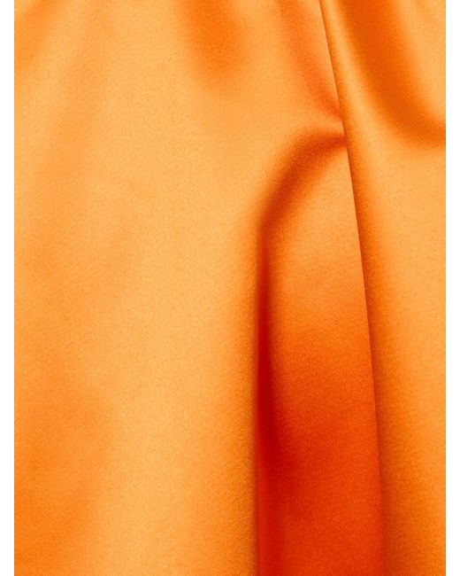 Jupe longue en satin duchesse à plis Patou en coloris Orange