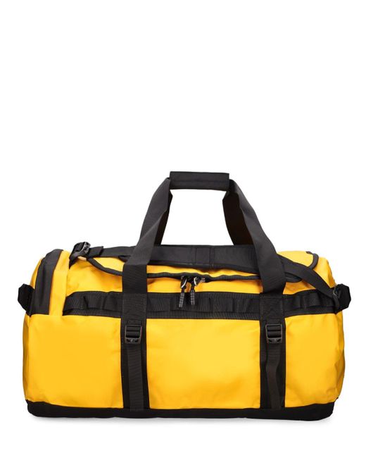 The North Face 71l Base Camp Duffle Bag in Yellow for Men Lyst UK