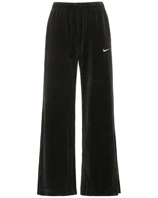 Pantaloni larghi in velour di Nike in Black