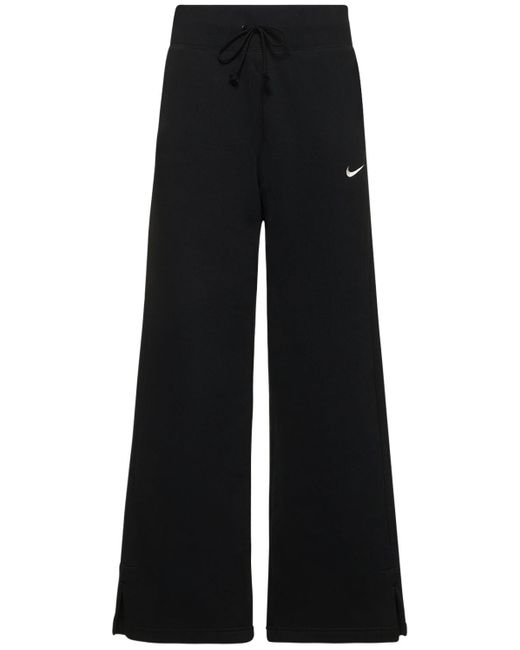 Pantaloni larghi vita alta in misto cotone di Nike in Black