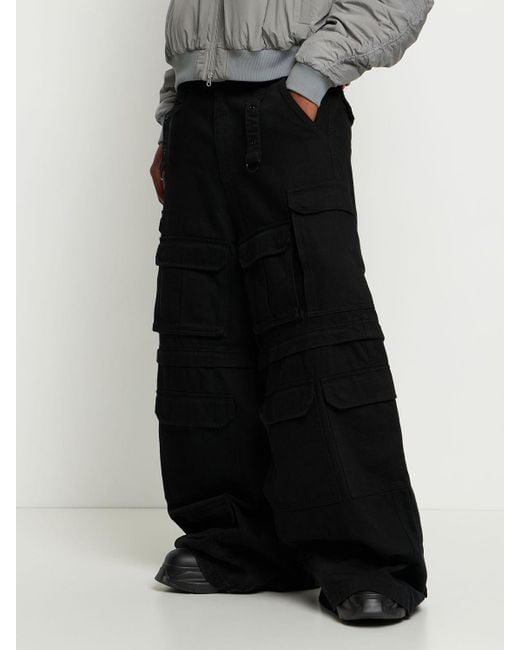 VETEMENTS Multipocket Cargo Jeans | Black | FARFETCH ID