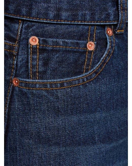 Jeans larghi vita media in denim / cintura di Sacai in Blue