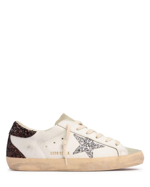 Baskets en cuir et daim super star 20 mm Golden Goose Deluxe Brand en coloris White
