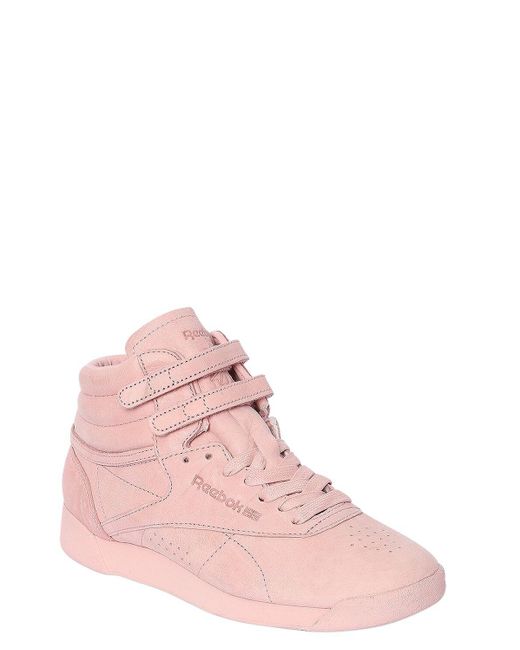 pink reebok high tops
