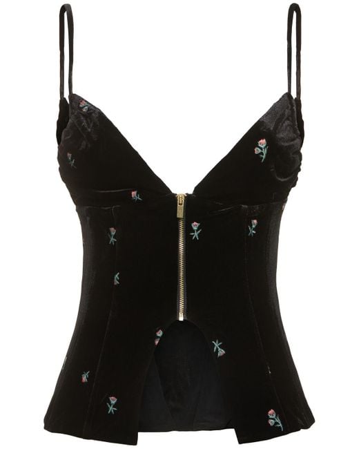 Peplum embroidered velvet corset top di WeWoreWhat in Black