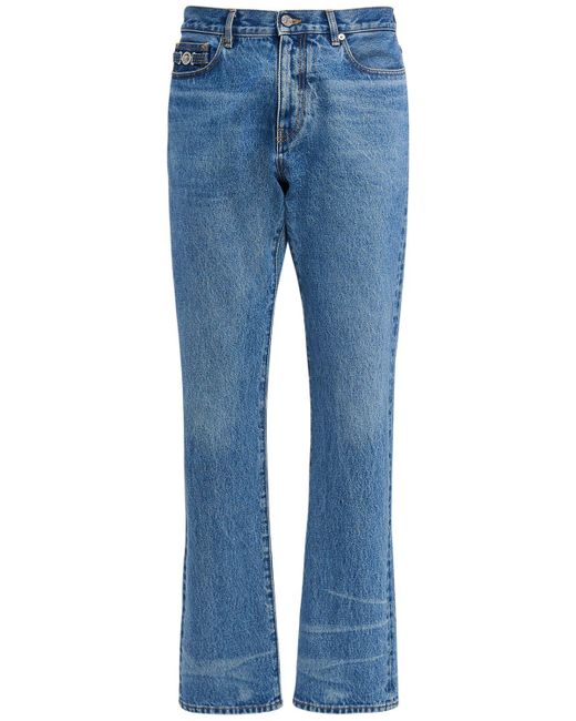 Jeans in denim di cotone di Versace in Blue da Uomo