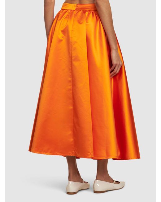 Jupe longue en satin duchesse à plis Patou en coloris Orange