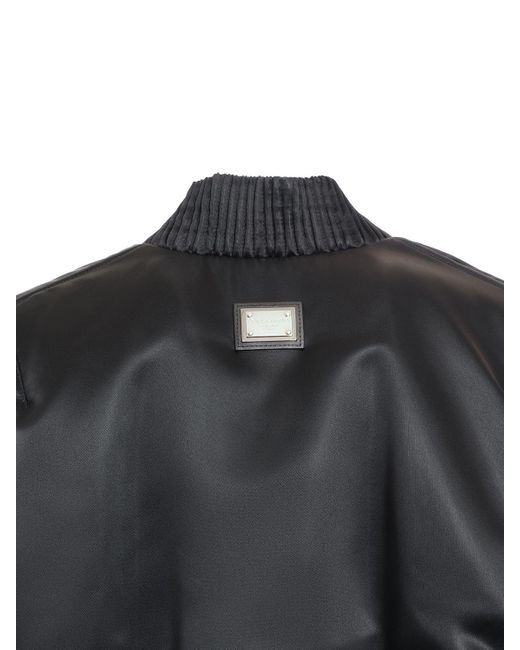 Veste bomber courte en satin drapé Dolce & Gabbana en coloris Black