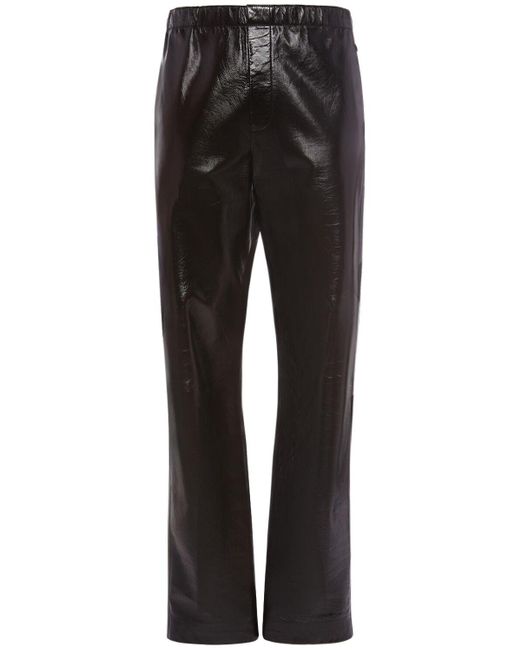 Pantaloni elasticizzati in pelle lucida di Bottega Veneta in Black da Uomo