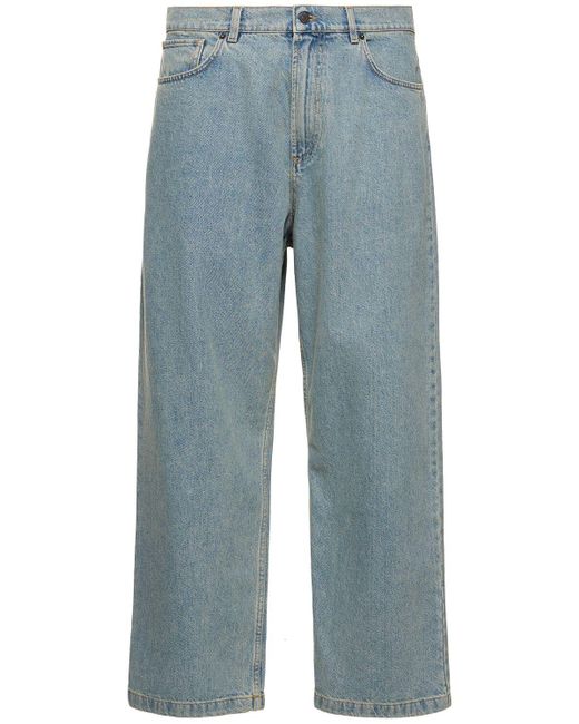 Jeans larghi in denim di cotone di Moschino in Blue da Uomo