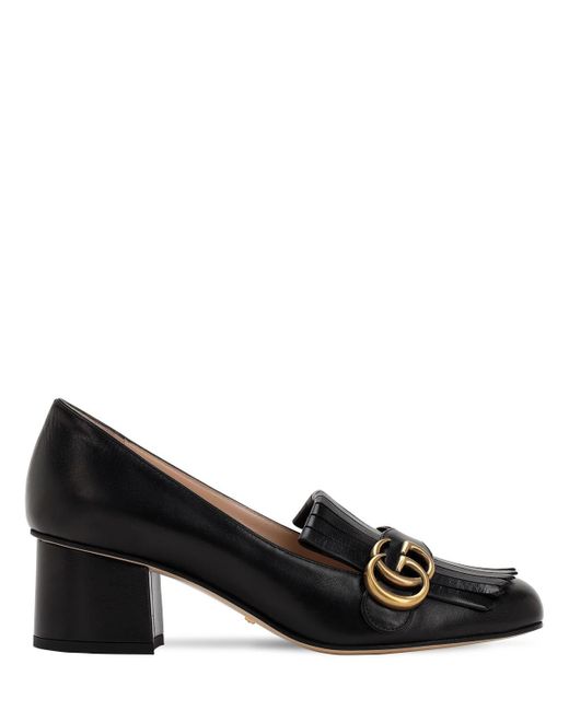 Zapatos de tacón Monogram con flecos Gucci de color Black