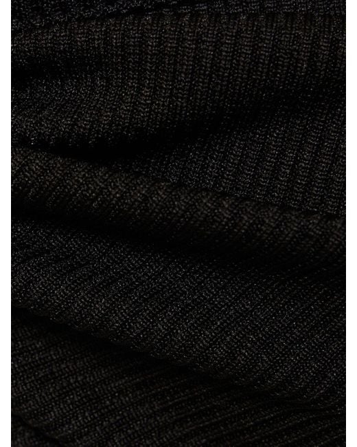 Crop top stone a maniche lunghe con cutout di Christopher Esber in Black