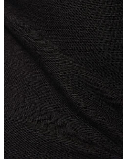 Robe courte en viscose sans bretelles presley Posse en coloris Black