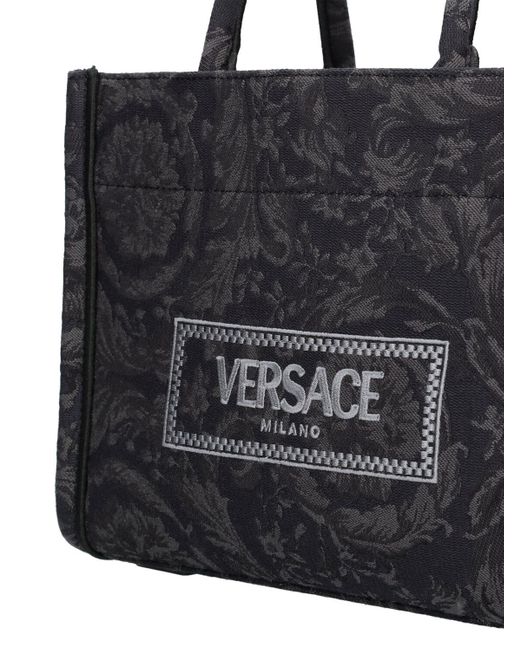 Petit sac cabas en jacquard barocco Versace en coloris Black