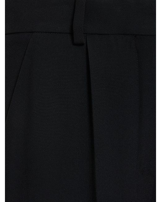 Pantalon évasé en cady taille haute Nina Ricci en coloris Black