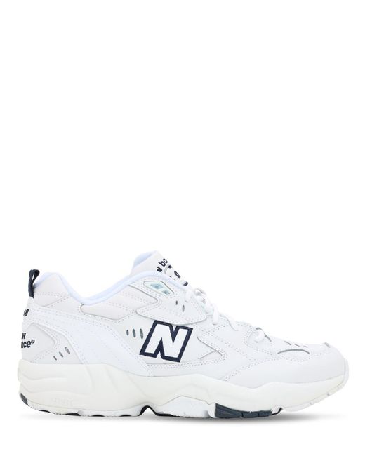 New Balance White Sneaker In Pelle E Tessuto Tecnico Con Para In Gomma E Logo Laterale