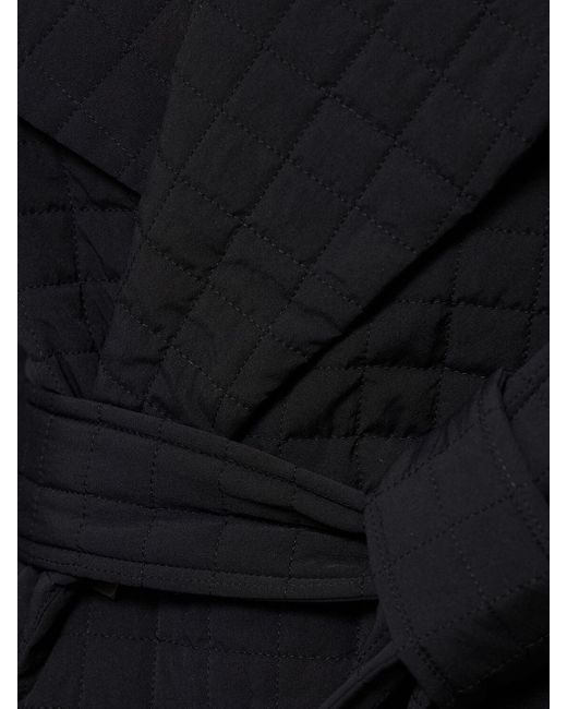 Veste courte matelassée avec ceinture Issey Miyake en coloris Black