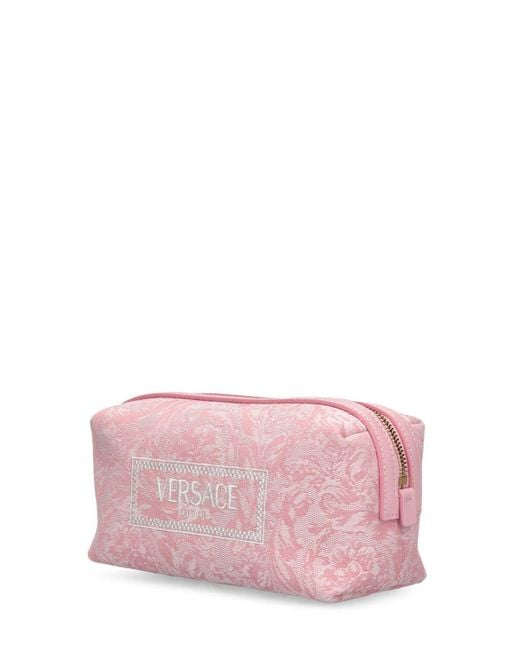 Neceser con logo jacquard Versace de color Pink