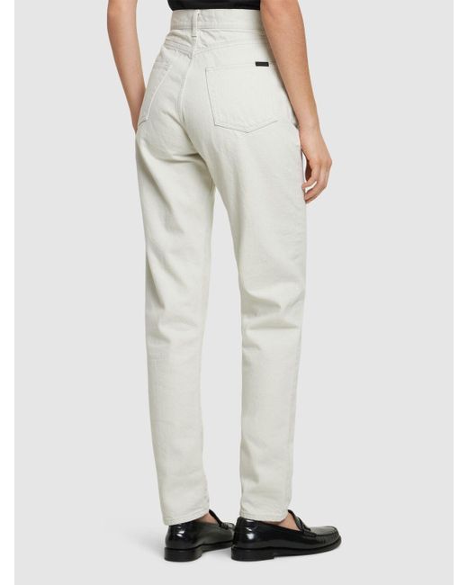 Jeans slim fit in denim di Saint Laurent in White