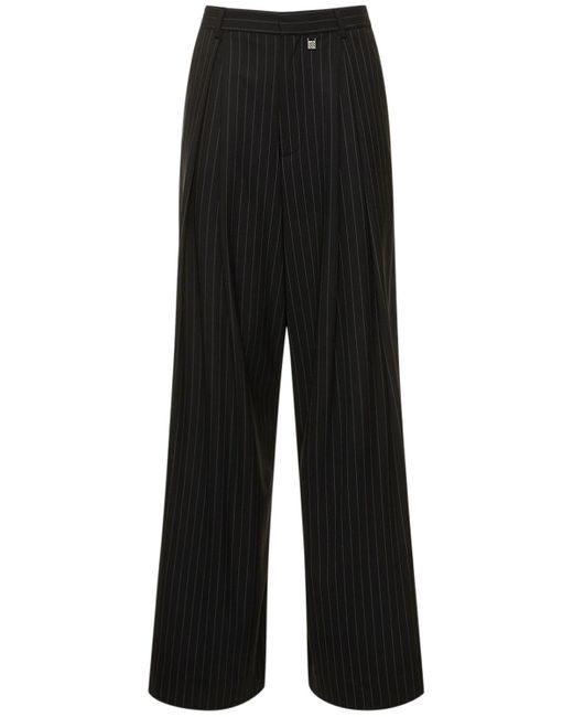 Pantaloni larghi in lana stretch di GIUSEPPE DI MORABITO in Black