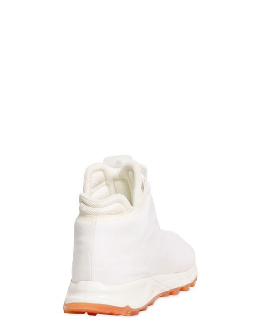 mallas reebok hombre beige