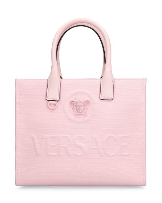 Borsa shopping piccola medusa in tela di Versace in Pink
