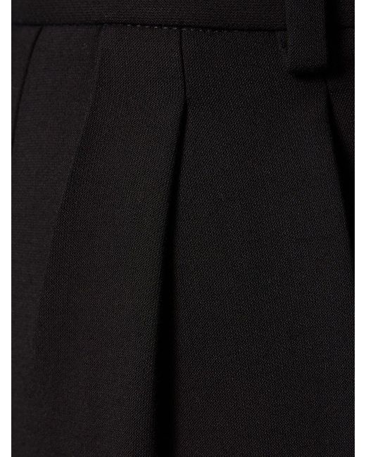 Pantalones anchos de viscosa Khaite de color Black