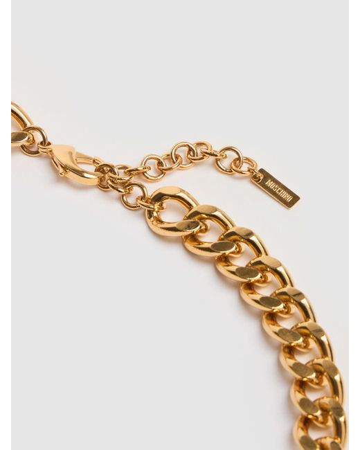 【送料&関税込】Moschino Logo Lettering Charm Detailed Neckl Moschino Logo Lettering Charm Collar Necklace in Metallic