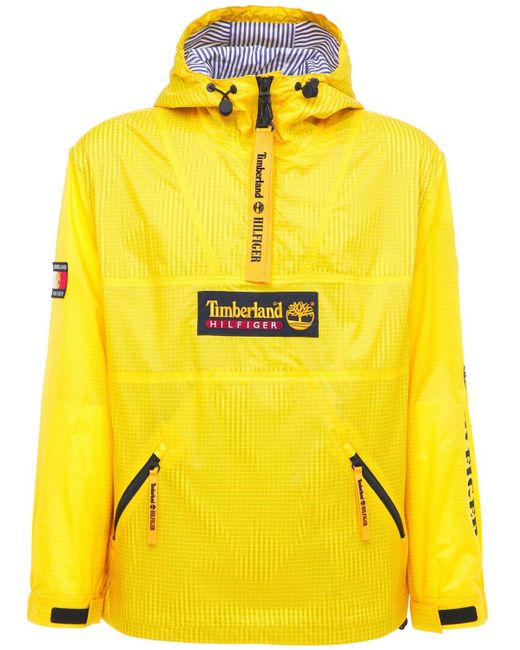 TOMMY HILFIGER x TIMBERLAND Logo Pop Over Wind Jacket in Yellow for Men |  Lyst Canada