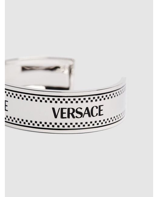 Jonc à logo en métal Versace pour homme en coloris White