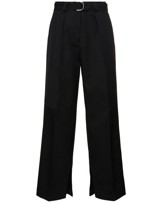 Pantalones anchos de lana con cinturón Jil Sander de color Black