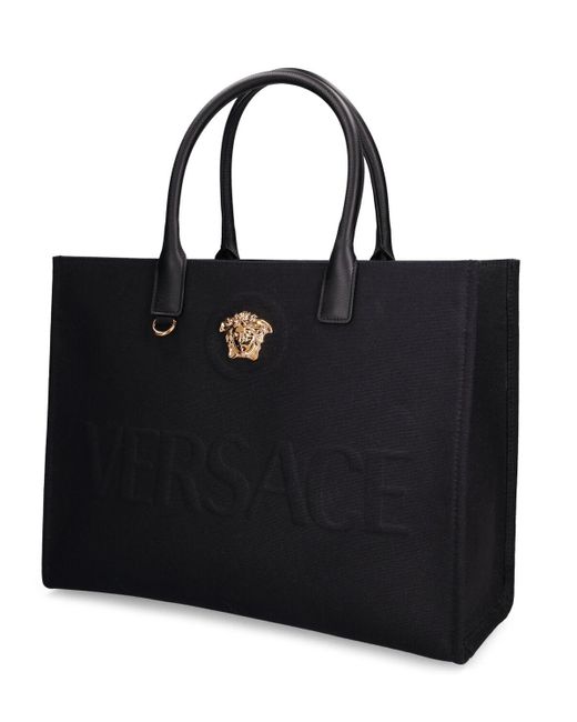 Borsa shopping in tela con logo di Versace in Black
